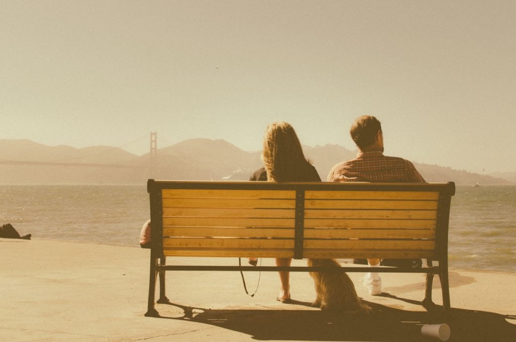couple sitting on a bench