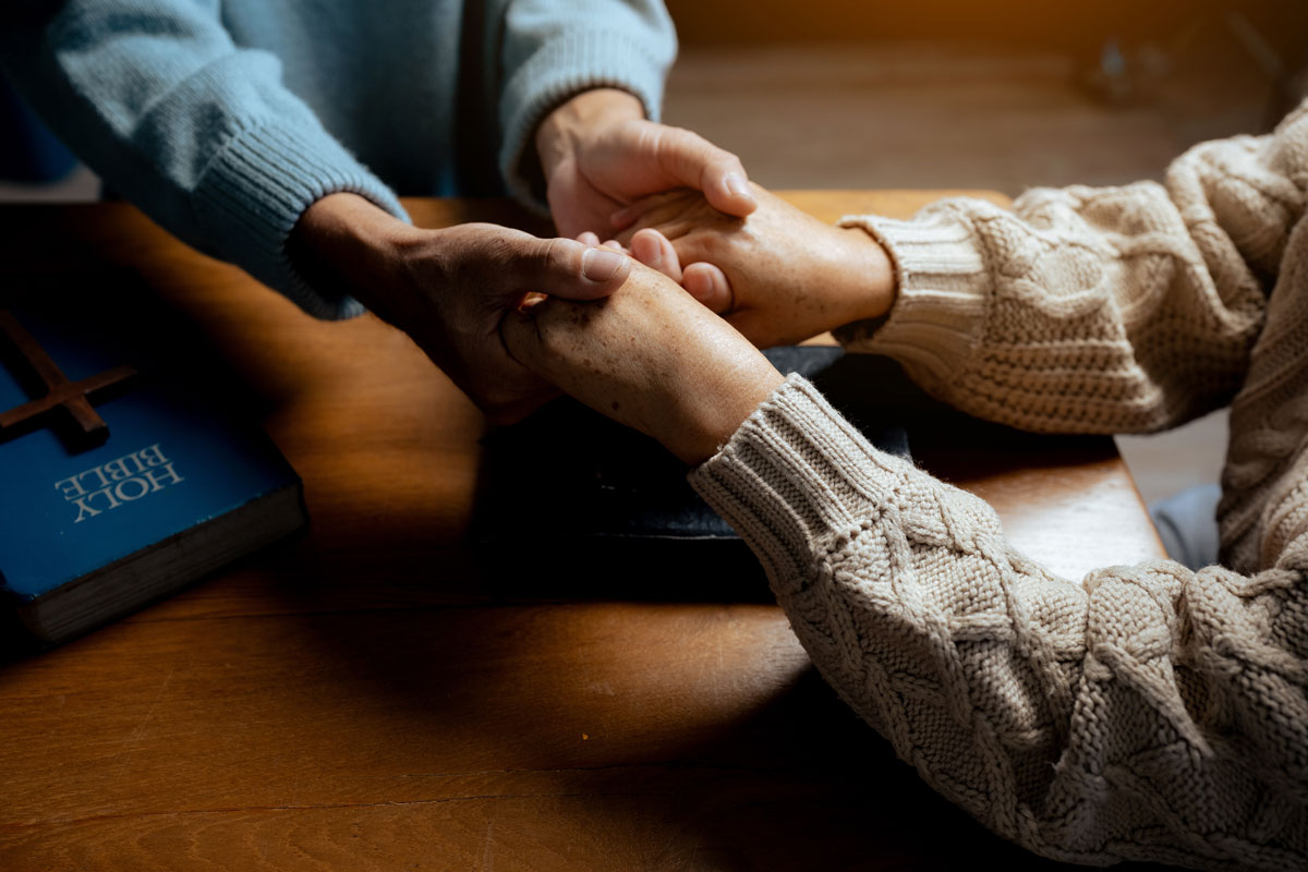 two people holding hands