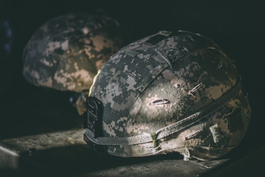 two soldiers helmets