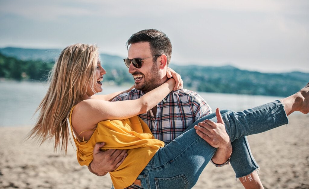 man holding woman